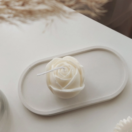 Vela natural en forma de rosa desde arriba